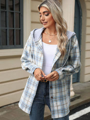 Light blue plaid shacket with contrast hood and button front detail.