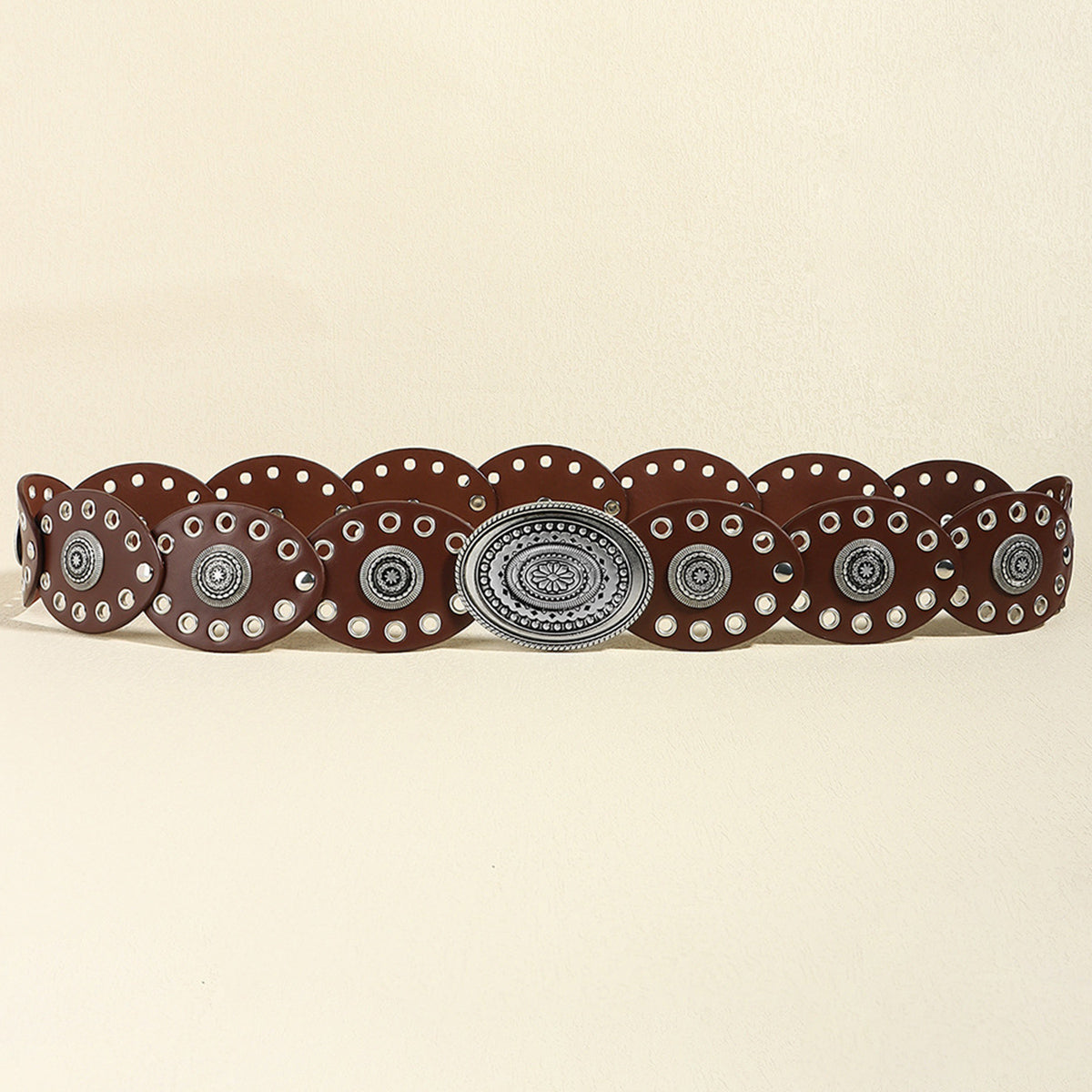 Dark brown leather belt with eyelet and antique silver oval buckle detail