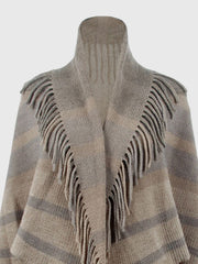 Textured knit capelet in Khaki with fringe detail and striped pattern.