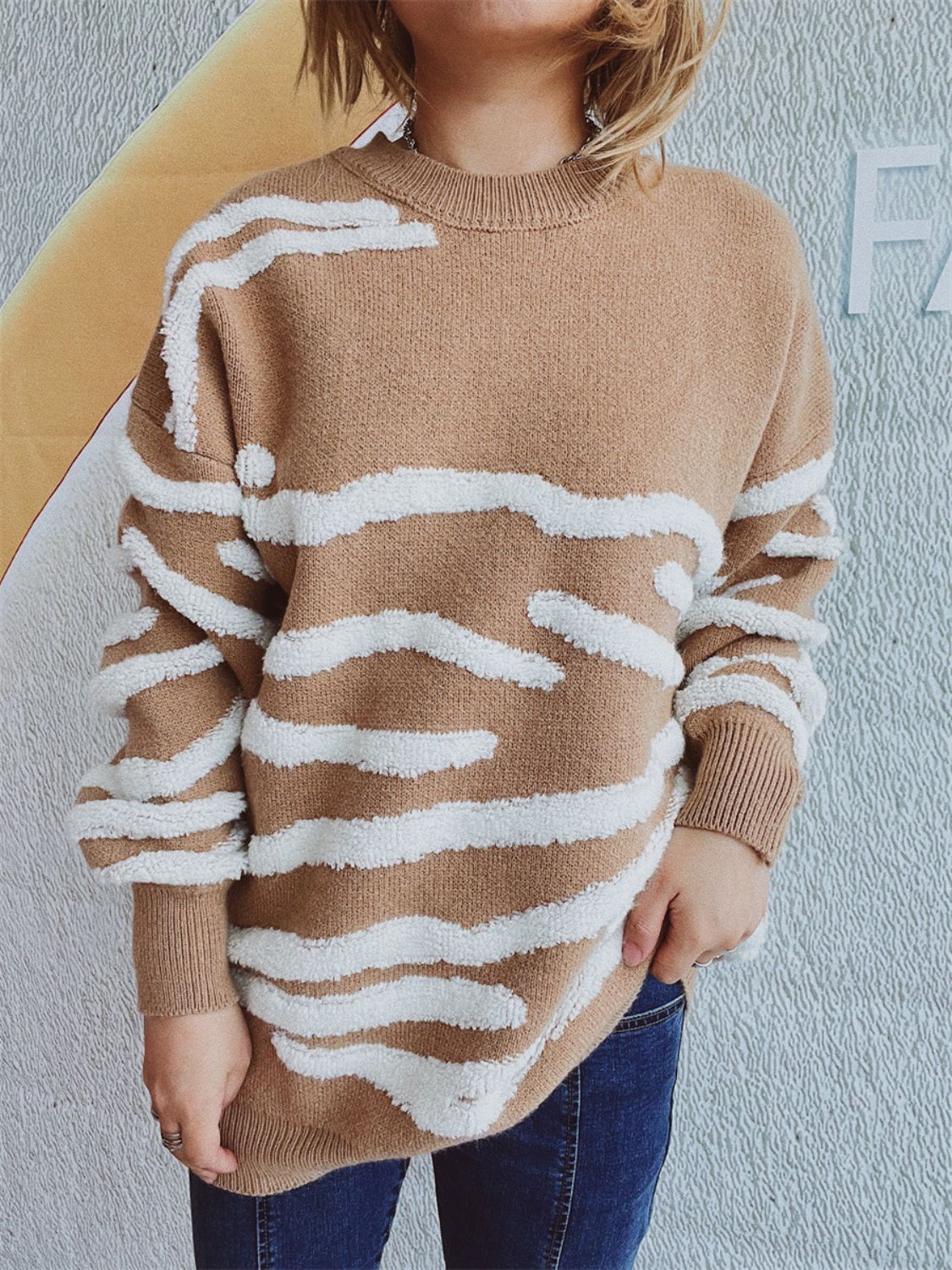 Textured stripe knit crewneck sweater in black, acrylic, basic style.