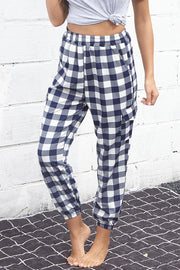 Gingham cargo joggers with elastic waist in navy and white, featuring a comfortable casual fit.