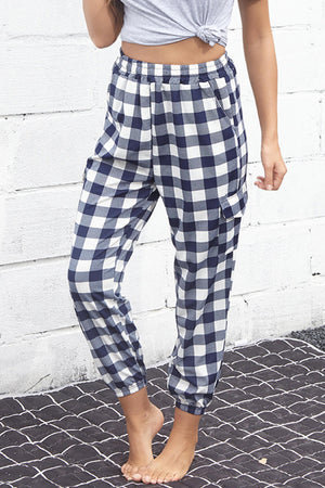 Gingham cargo joggers with elastic waist in navy and white, featuring a comfortable casual fit.