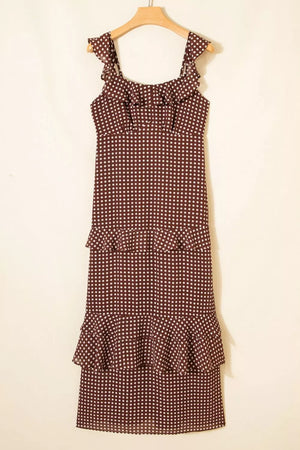 Brown polka dot maxi dress with ruffled neckline and tiered hem