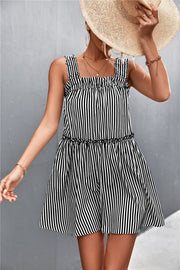 Black striped mini dress with ruffle yoke and tiered hem