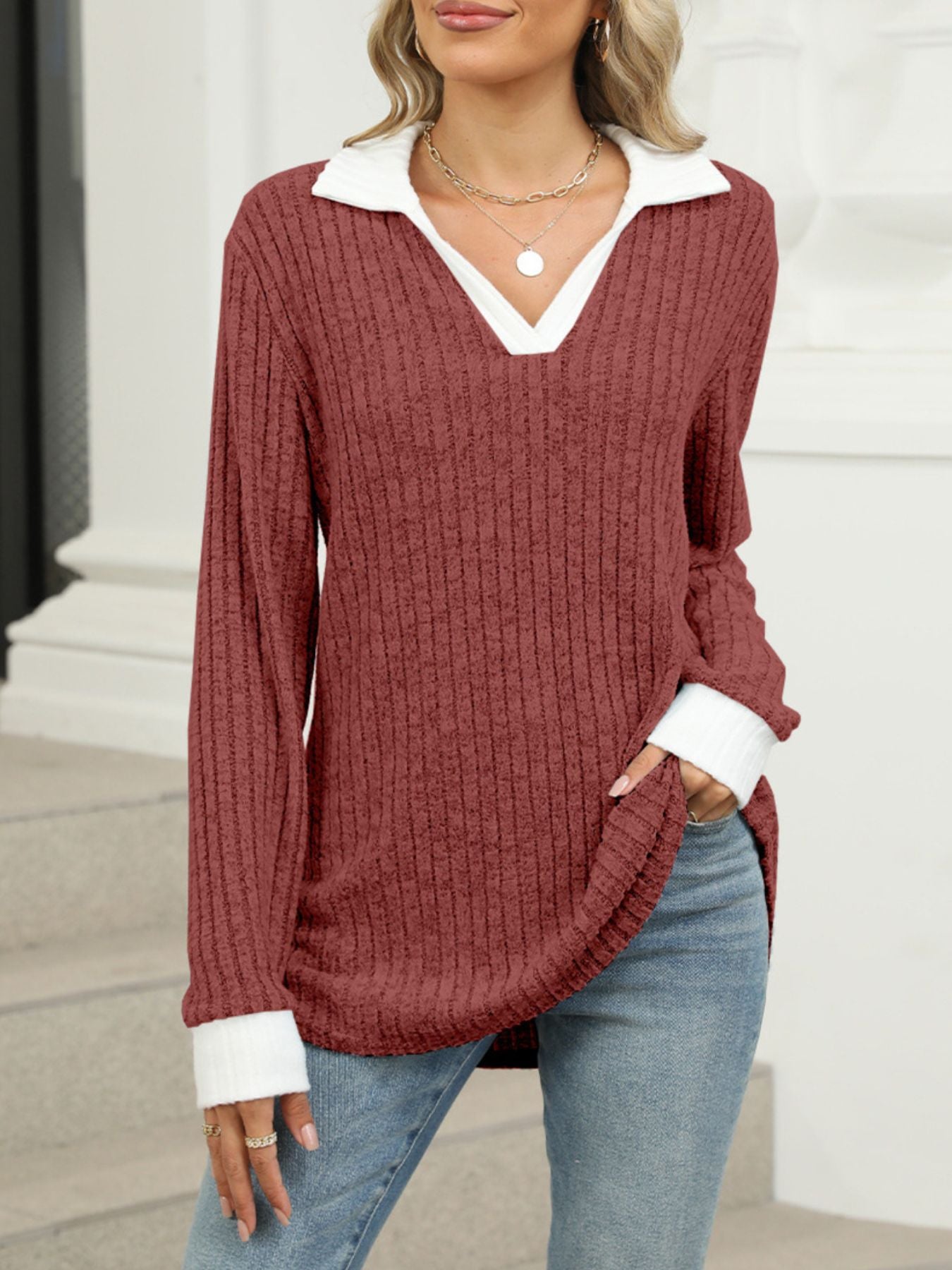 Ribbed knit long sleeve t-shirt in Rust Red with white collar and cuffs, V-neck.