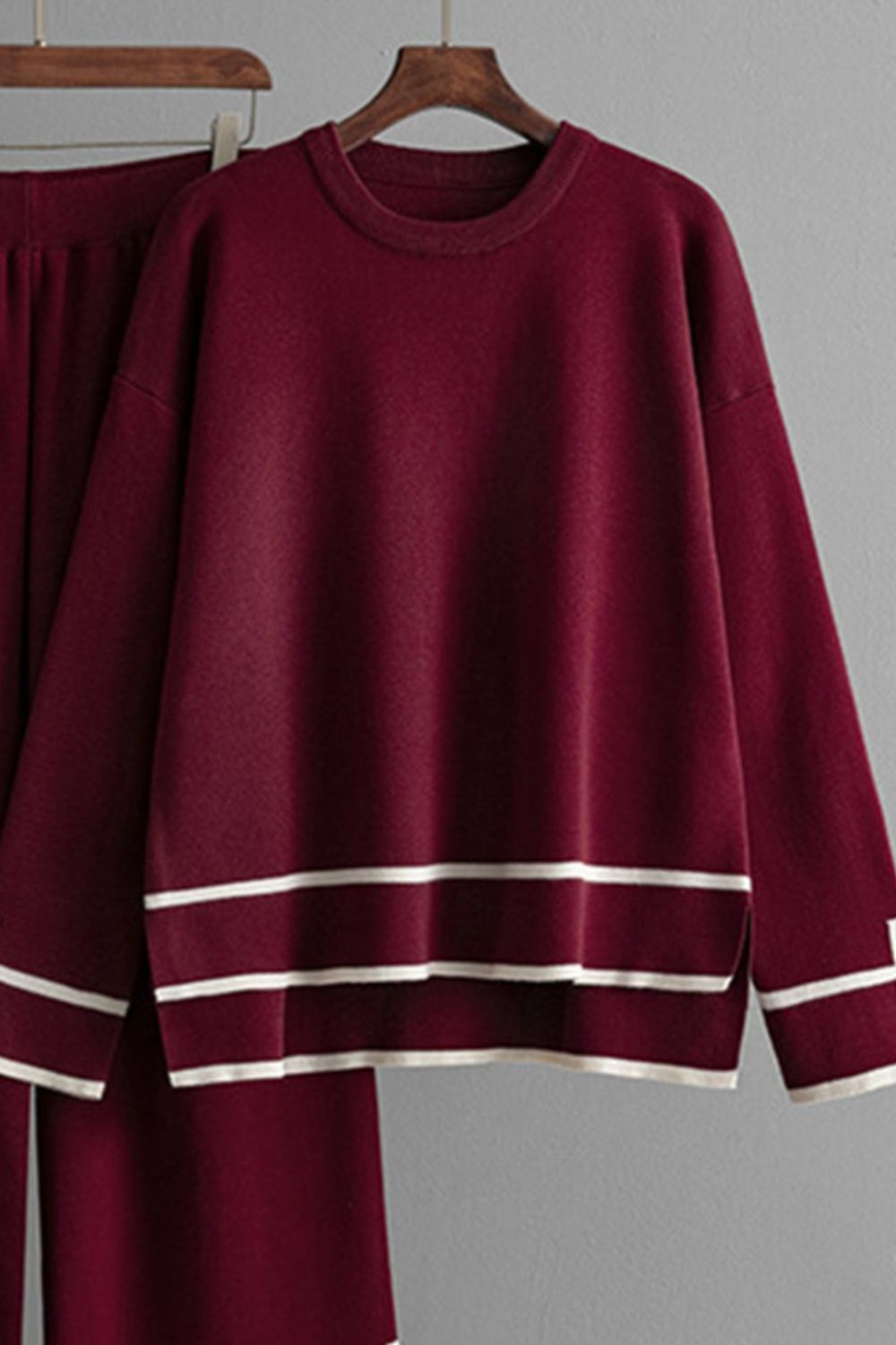 Burgundy acrylic loungewear set with round neck top and striped hem detail