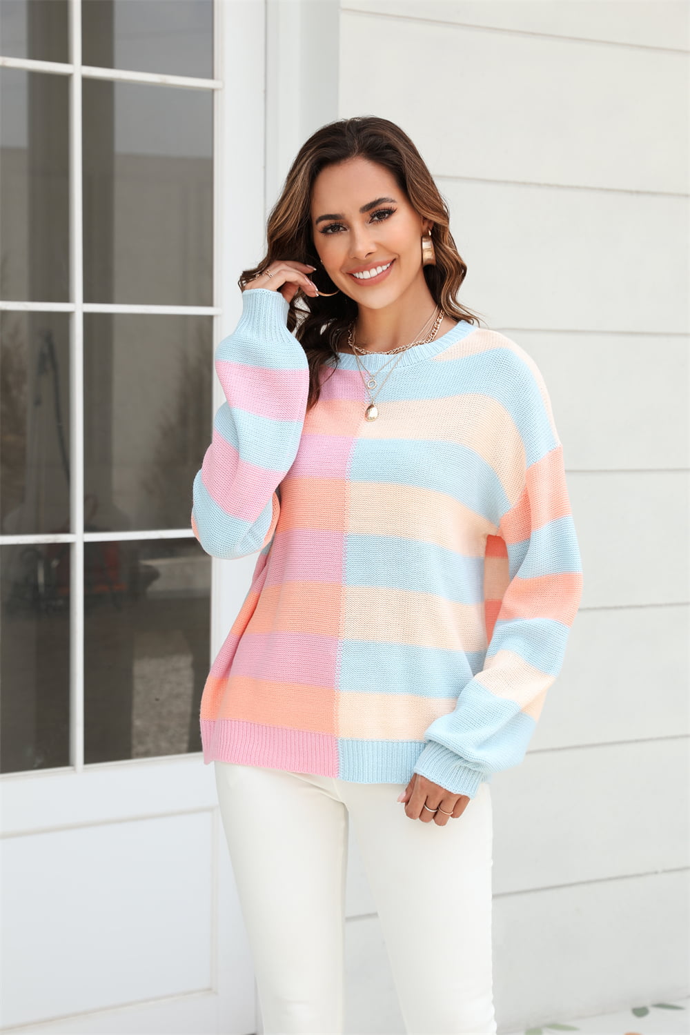 Pastel block stripe crewneck pullover sweater in acrylic with crew neck and long sleeves.