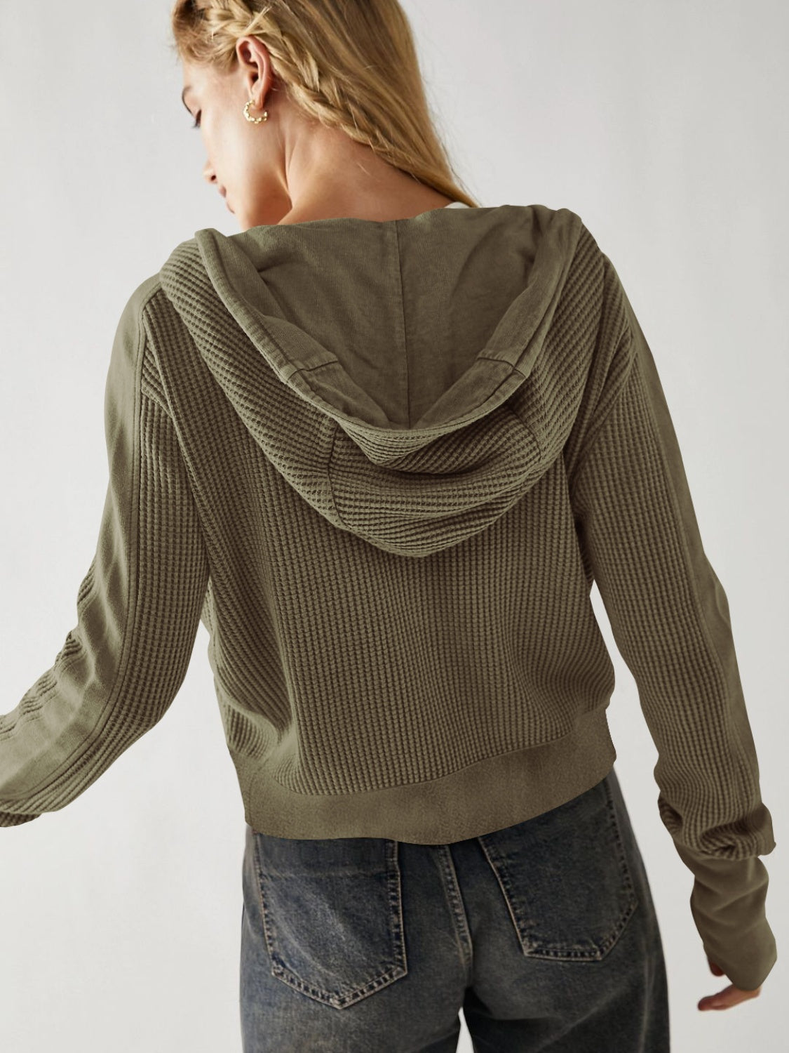 Waffle knit cropped hoodie in Matcha Green with a snap front and hood.