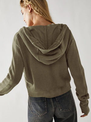 Waffle knit cropped hoodie in Matcha Green with a snap front and hood.