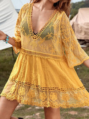 Gold lace tiered mini dress with V-neck and bell sleeves, perfect for beach cover-up.