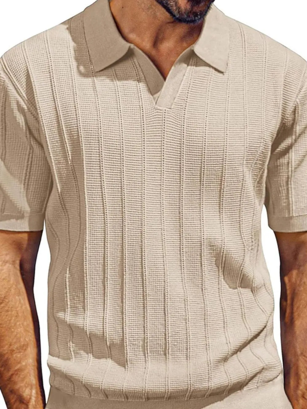 Khaki ribbed knit polo shirt with open placket and short sleeves.