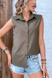 Olive brown textured sleeveless button-down shirt with shoulder pads and a collared neckline.