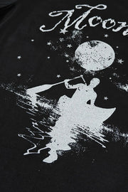 Black oversized tee with white graphic of a person kayaking under a moon and stars.