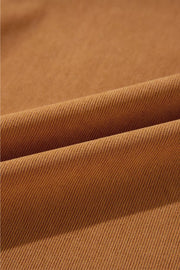 Caramel corduroy fabric detail of a puff sleeve mini dress