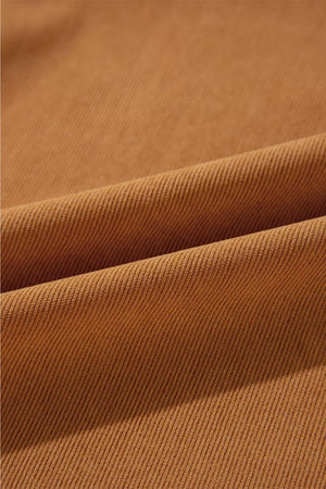 Caramel corduroy fabric detail of a puff sleeve mini dress