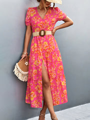 Hot pink floral print midi dress with puff sleeves, V-neck, and tiered skirt.
