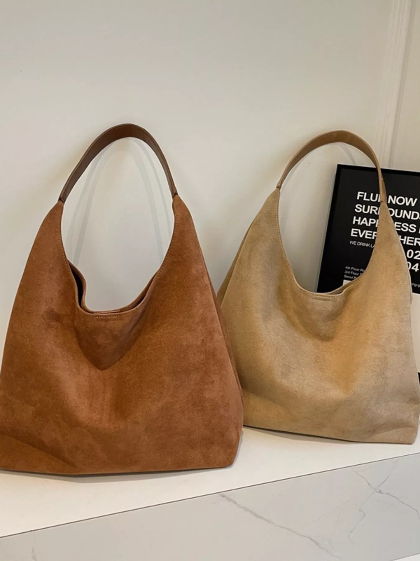 Elegant suede hobo tote mini handbag in brown and khaki with leather straps.