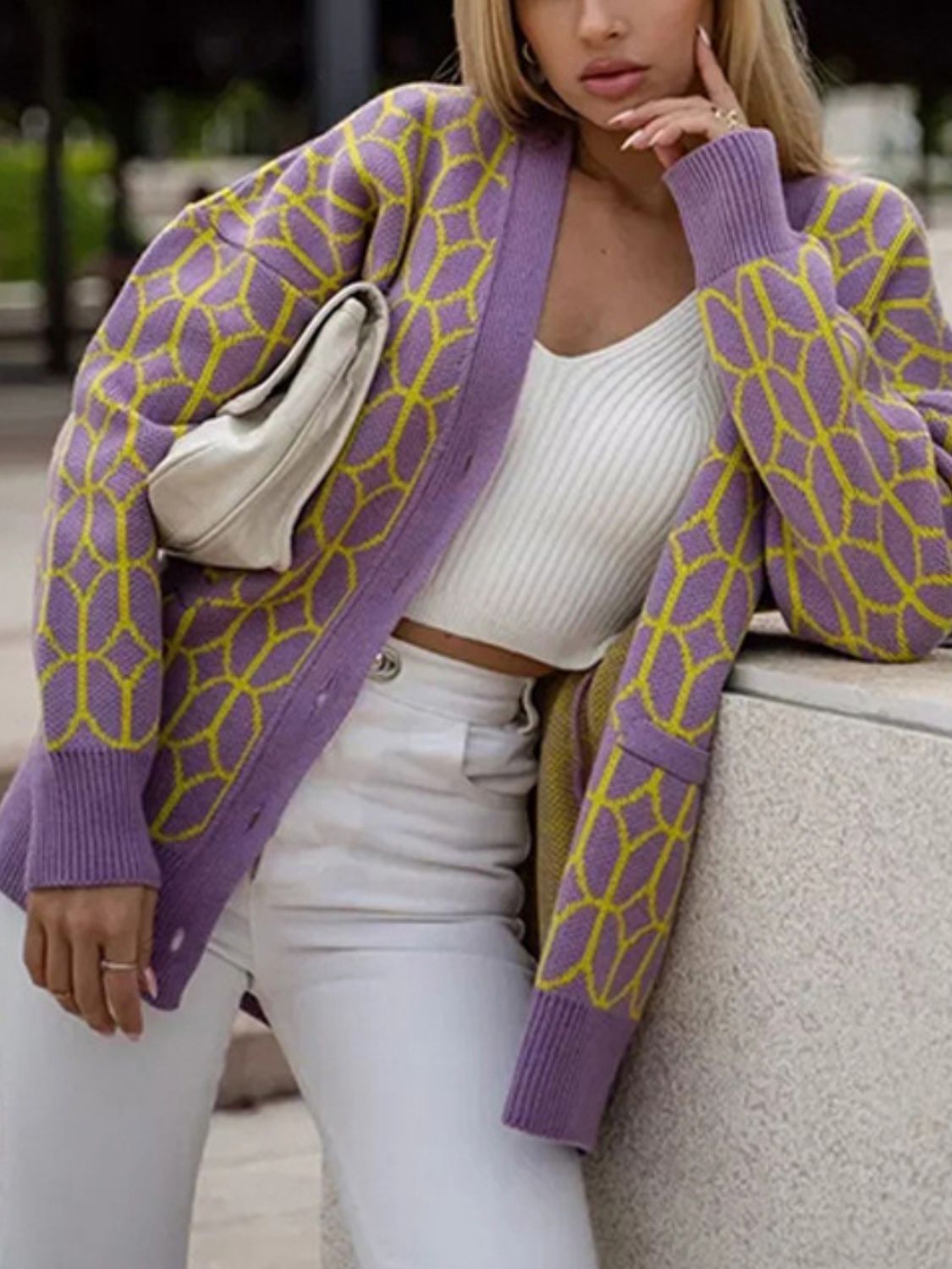 Geometric knit button-up cardigan in purple with yellow pattern, acrylic, long sleeves, V-neck.