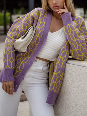 Geometric knit button-up cardigan in purple with yellow pattern, acrylic, long sleeves, V-neck.