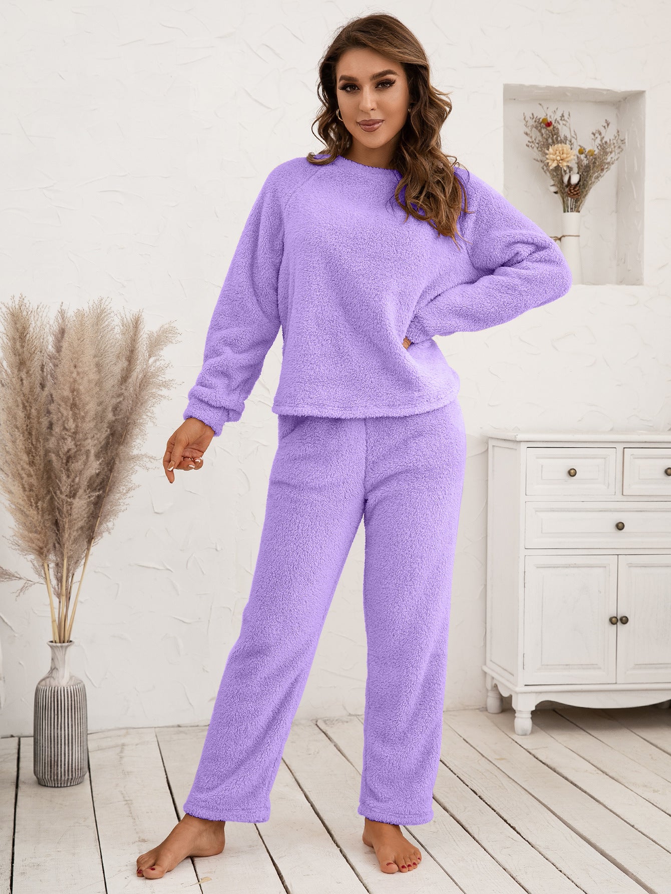 Plush lavender loungewear set with raglan sleeves and straight-leg pants.