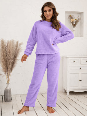 Plush lavender loungewear set with raglan sleeves and straight-leg pants.