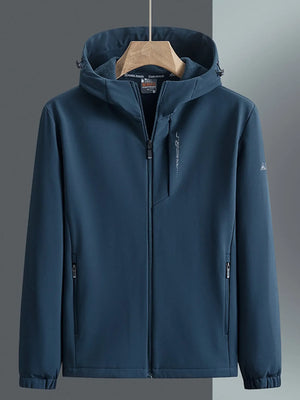 Men's hooded windbreaker in Peacock Blue with zippered pockets and subtle sleeve logo.
