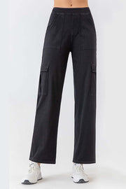 Black denim cargo pants with multiple pockets and a relaxed fit.