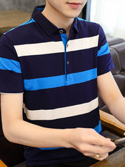Men's navy blue cotton polo shirt with horizontal white and bright blue stripes, short sleeves, and buttoned placket.
