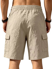 Apricot cargo shorts with drawstring waist and crinkled texture.