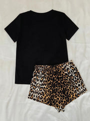 Black t-shirt and leopard print shorts pajama set with elastic waistband.