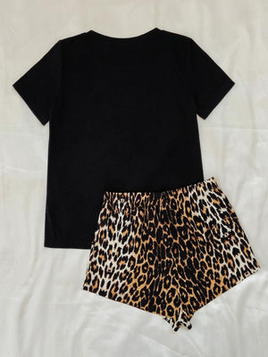 Black t-shirt and leopard print shorts pajama set with elastic waistband.