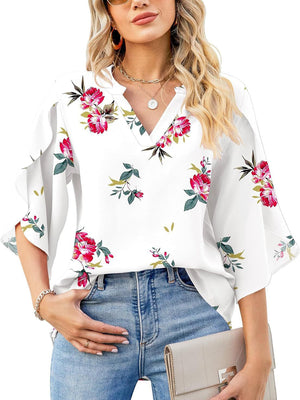 White floral print blouse with flutter sleeves and V-neck