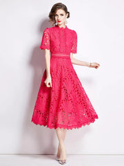 Pink lace midi dress with delicate sleeves and a-line skirt.