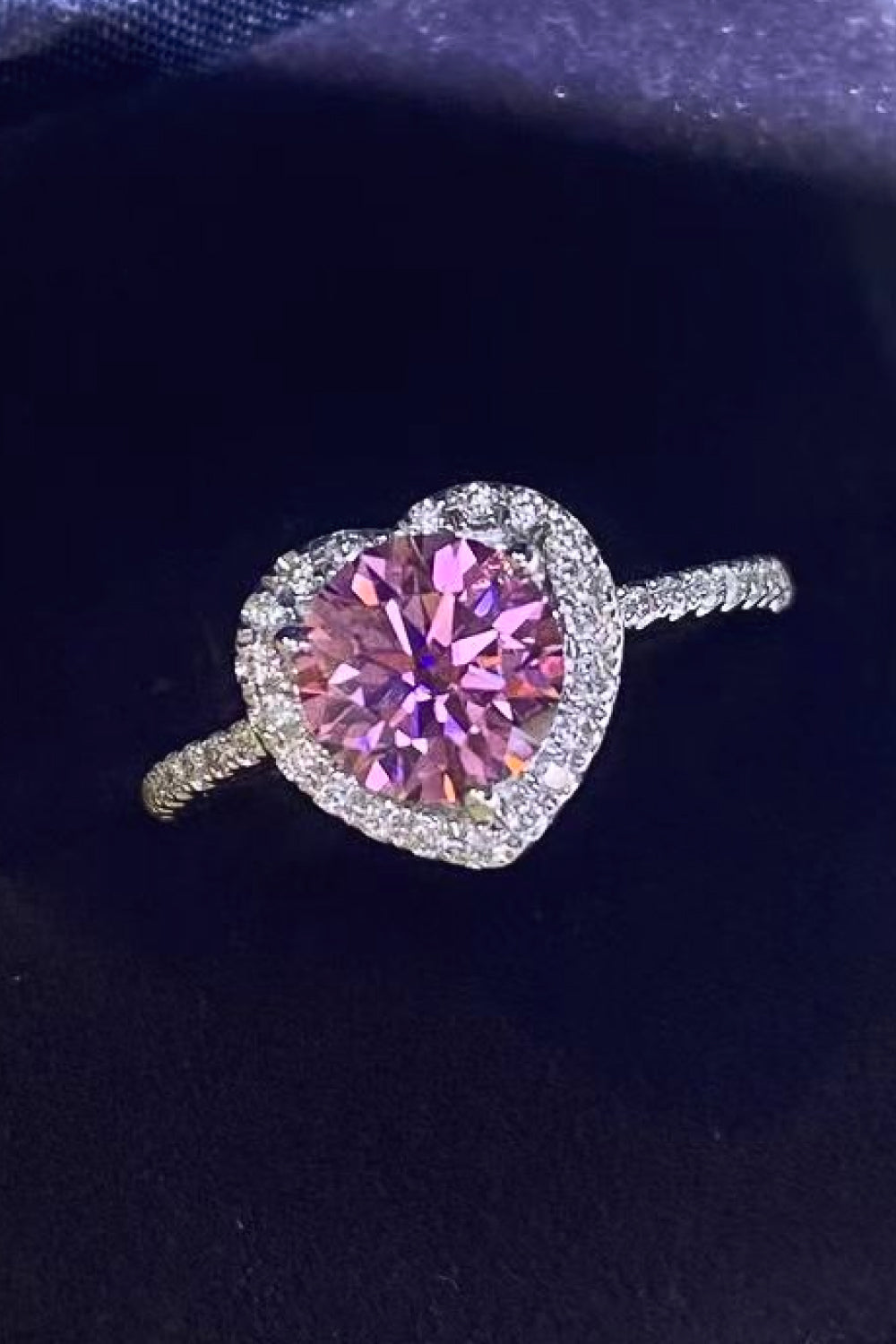 Pink moissanite heart halo ring with diamond band