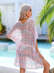 Lace-knit kaftan cover-up in pastel pink, green, and lavender with side tie detail.