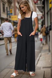 Black gathered bib wide-leg jumpsuit with tie back and pockets