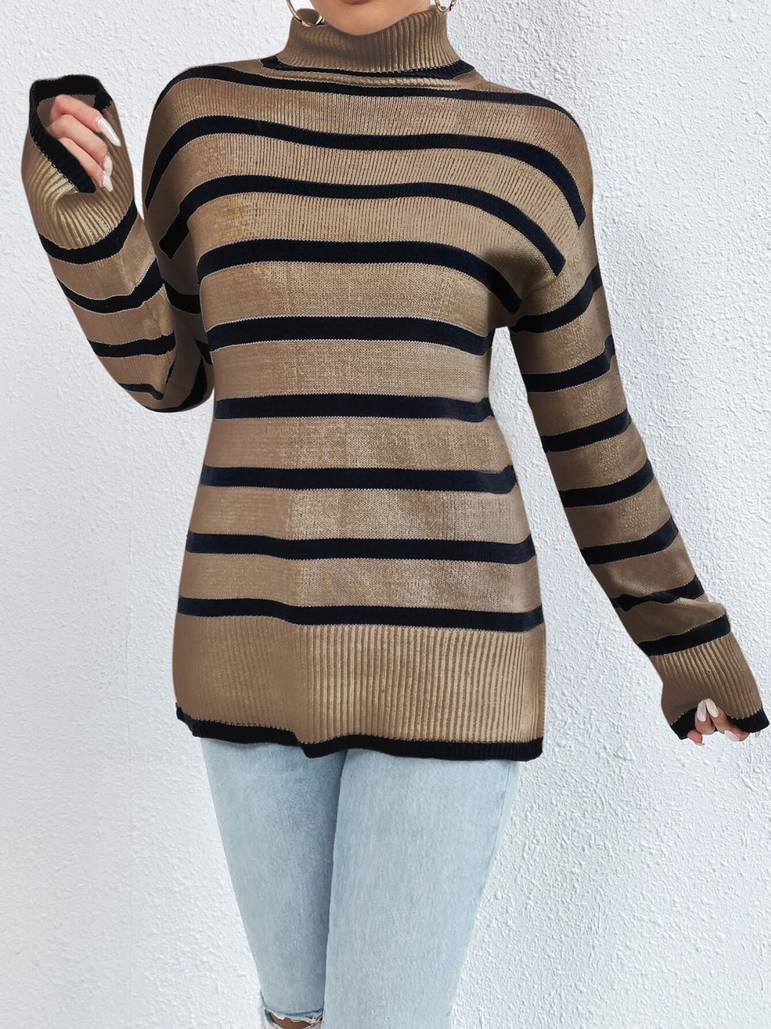 Oversized camel and black stripe turtleneck sweater with ribbed cuffs and hem.