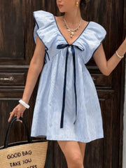 Blue striped mini dress with ruffled sleeves, V-neck, and bow detail.