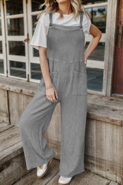 Gray textured cotton overalls with square pockets and wide legs