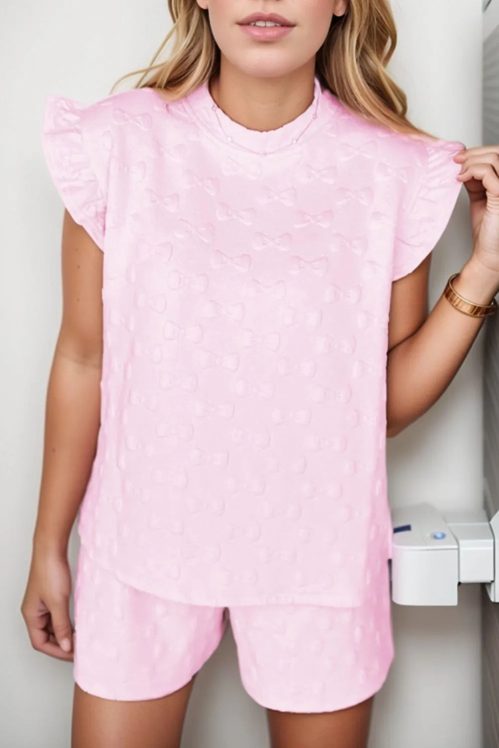 Embossed bow ruffle sleeve lounge set in blush pink.