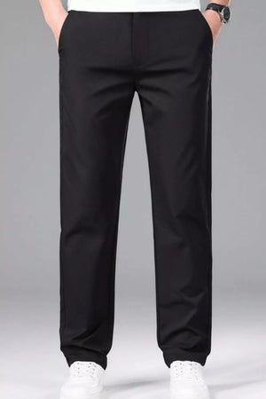 Men's black slim-fit stretch dress pants with a basic style and smooth finish.