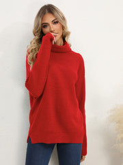 Textured knit oversized turtleneck pullover in Deep Red, acrylic, with ribbed detail.