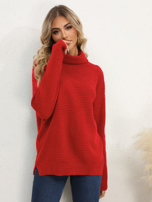 Textured knit oversized turtleneck pullover in Deep Red, acrylic, with ribbed detail.