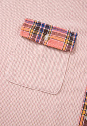 Blush pink waffle knit shacket with plaid trim pocket detail and button.