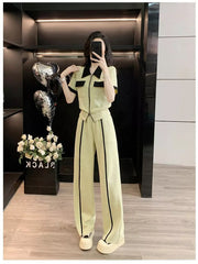Beige zip-up top and wide-leg pants set with black trim and collar.