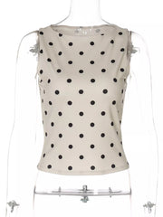 Chic polka dot tank top in khaki with a boat neck and cropped fit.