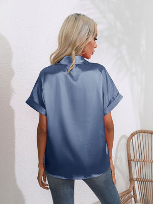 Dusty Blue satin boxy sleeve blouse with cuffed short sleeves.