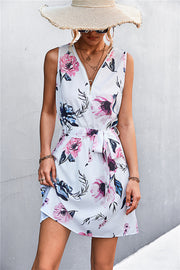 White floral zip-front mini dress with tie waist and v-neck