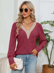 Brick Red ribbed knit sweater with crochet V-neck and long sleeves.