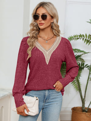 Brick Red ribbed knit sweater with crochet V-neck and long sleeves.